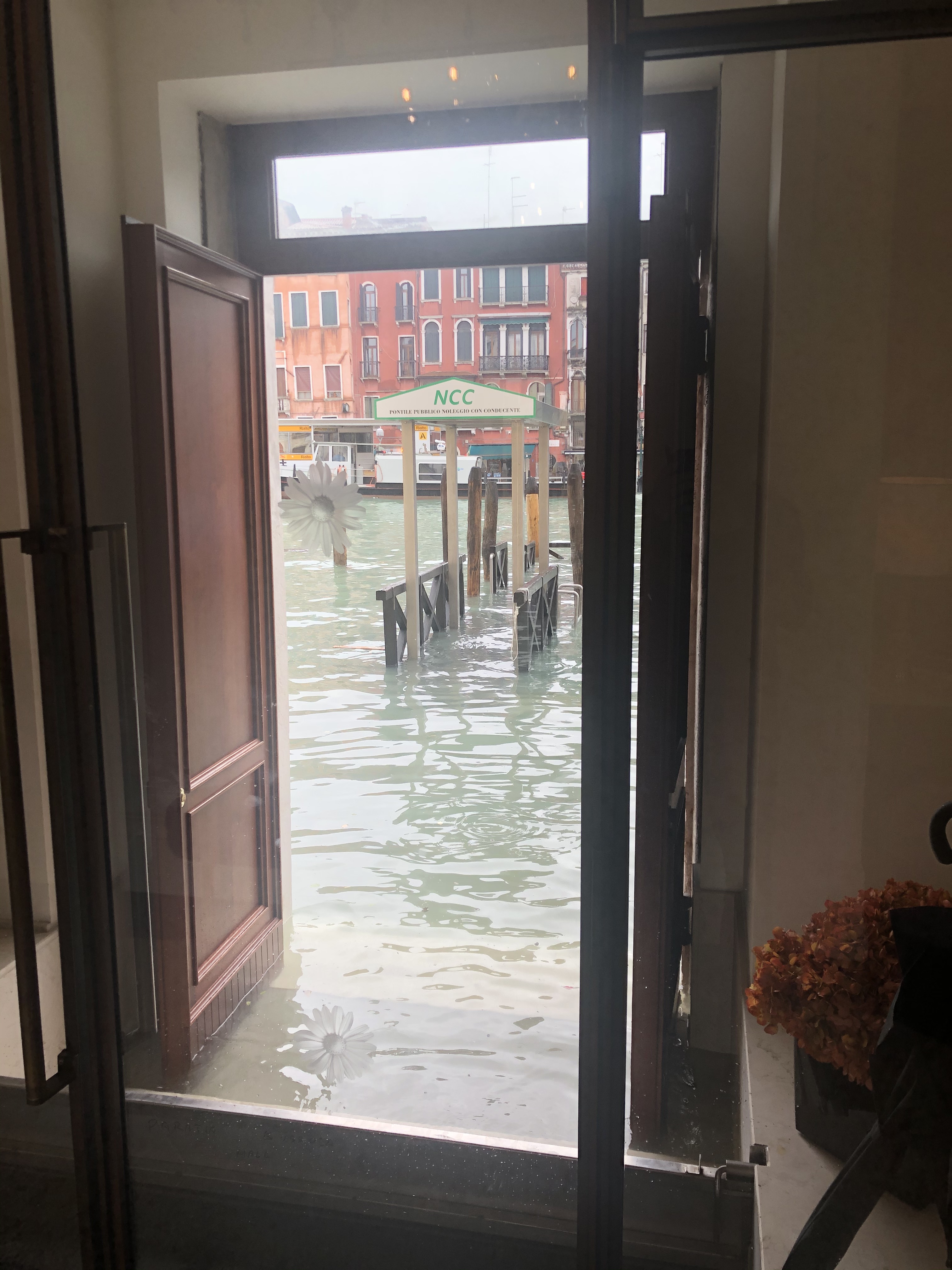 Flood Water Lapping Over The Hotel Steps